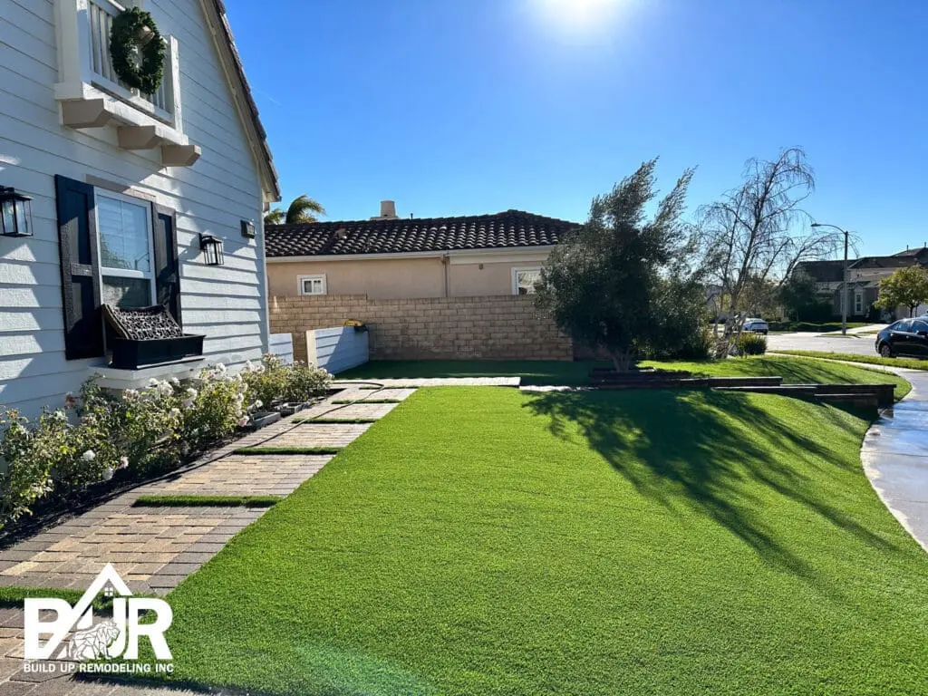 PAVERS AND TURF IN FRONT YARD DRIVEWAY