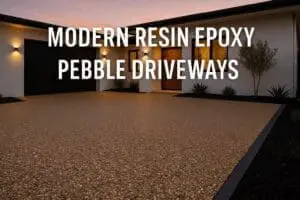 Modern resin epoxy pebble driveway at sunset.