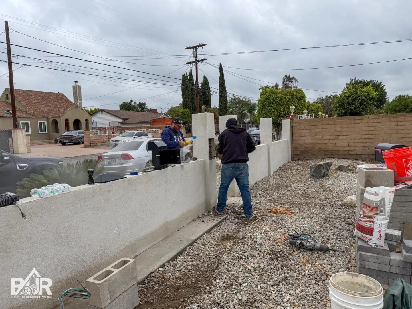 Backyard retaining wall and outdoor living space